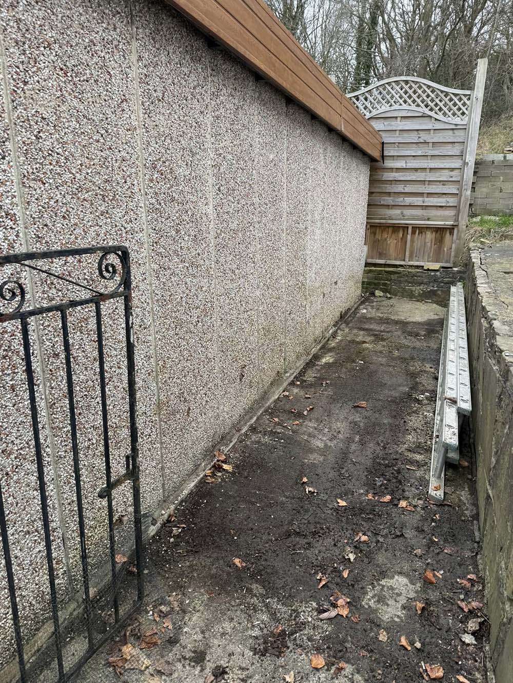 Garden alley cleared of waste in West Yorkshire