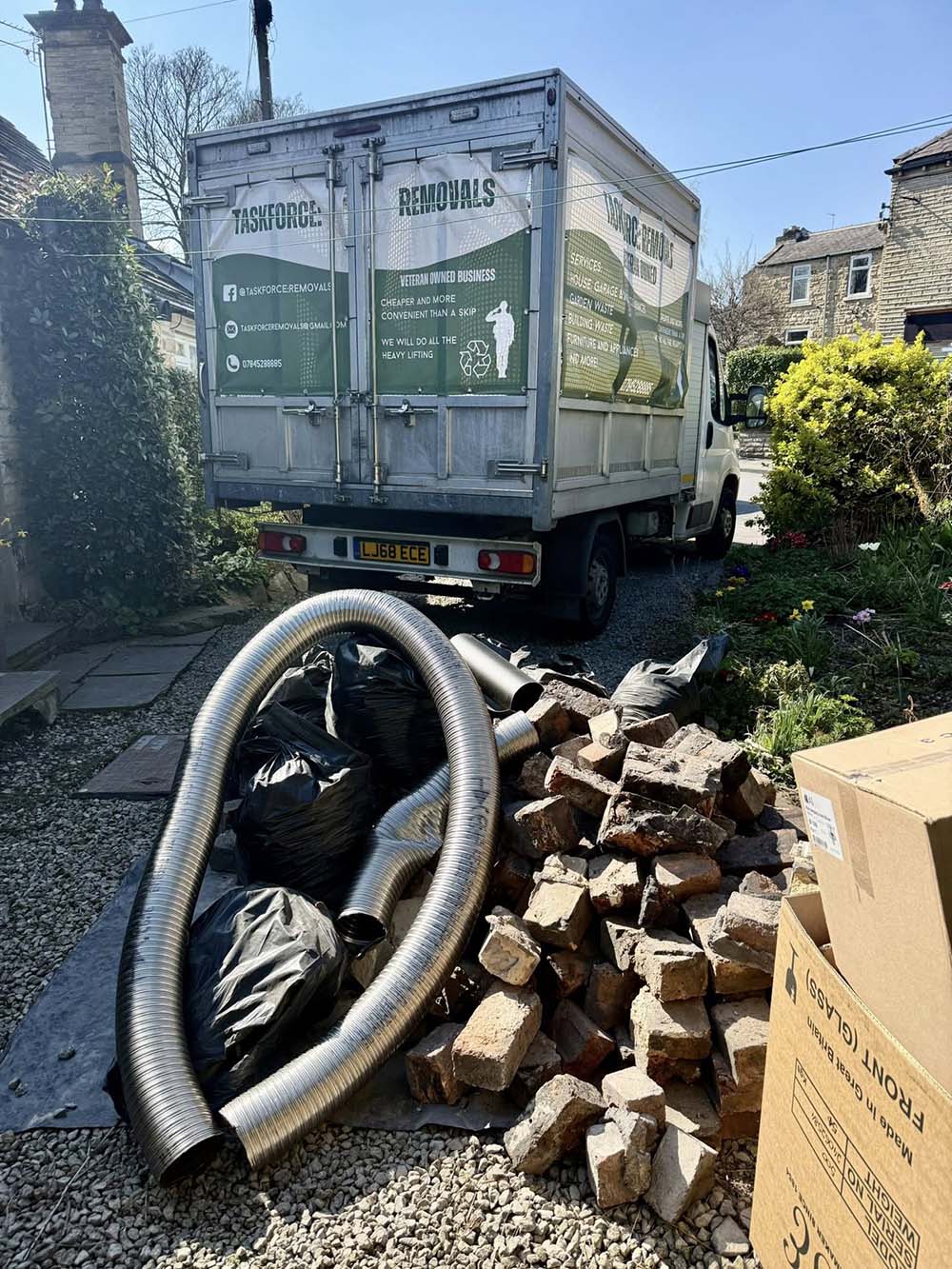 Taskforce Removals van on a waste removal job in West Yorkshire